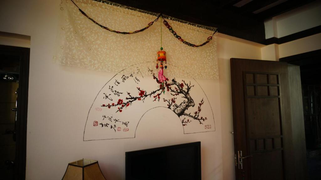 Lijiang Wangjia Courtyard Inn Стая снимка